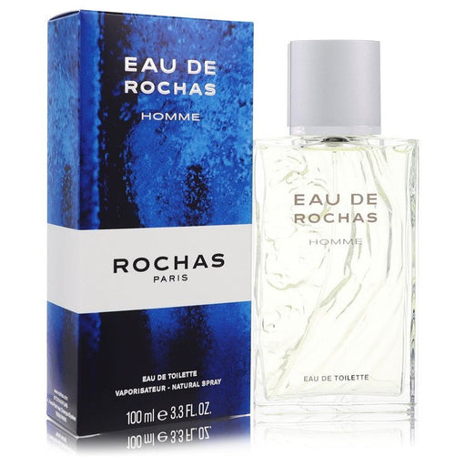 Eau De Rochas Eau De Toilette Spray for men in a 3.4 oz bottle, featuring a sleek design and refreshing fragrance.