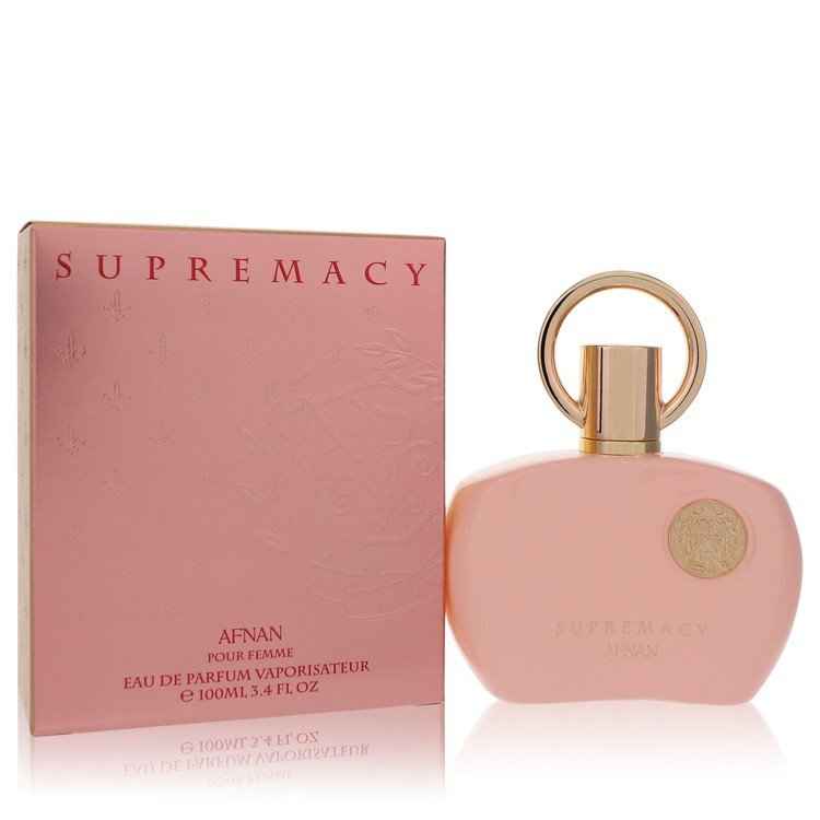 Afnan Supremacy Pink Eau De Parfum spray bottle for women, 3.4 oz, featuring a sleek pink design and elegant branding.