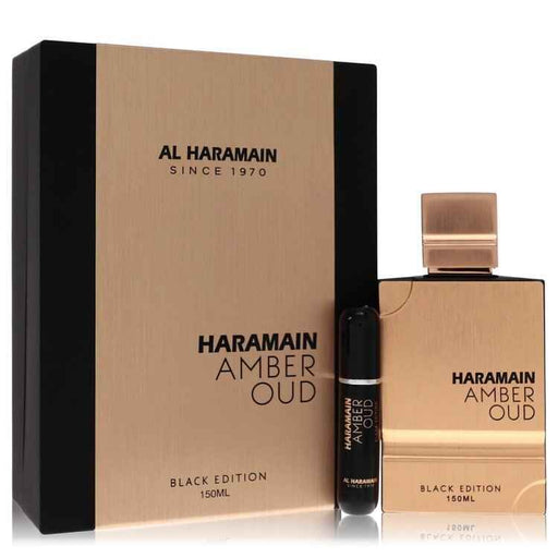 Amber Oud Black gift set by Al Haramain for men, includes perfume bottles and accessories in sleek packaging.
