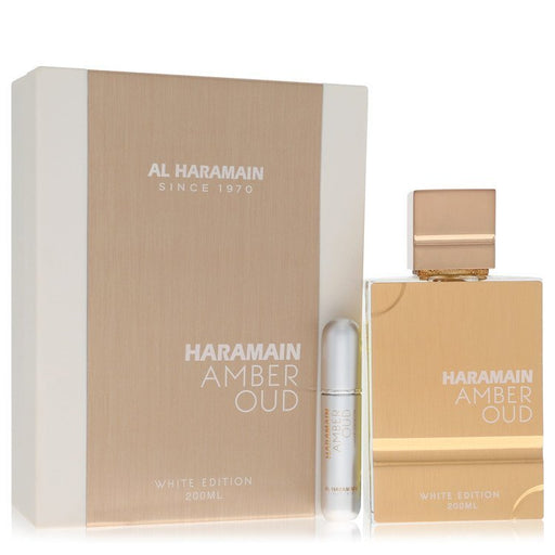 Al Haramain Amber Oud White Edition Eau De Parfum spray for men and unisex, 6.7 oz bottle with elegant white packaging.