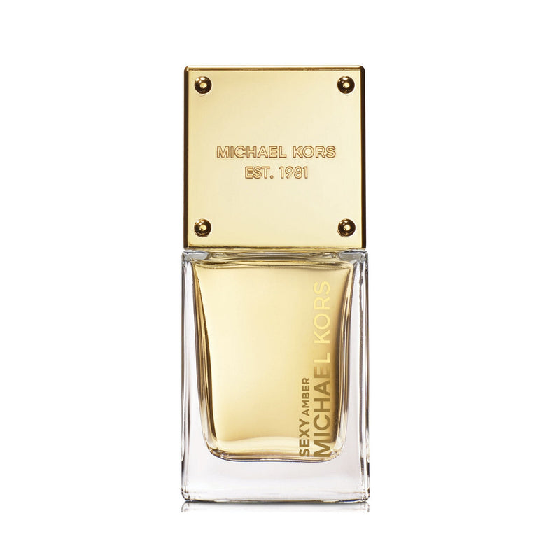 Sexy Amber Eau De Parfum spray by AppleMango Trading Co, 1.0 oz, in a sleek bottle with a warm amber hue.