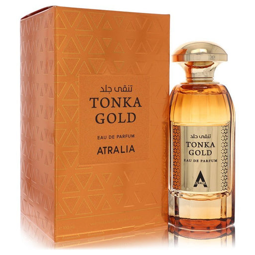 Atralia Tonka Gold Eau De Parfum Spray for Men and Unisex, 3.4 oz bottle with gold accents and elegant packaging.