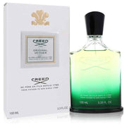 Creed Original Vetiver Eau De Parfum spray for men, 3.3 oz, featuring a sleek bottle with a textured label and silver cap.