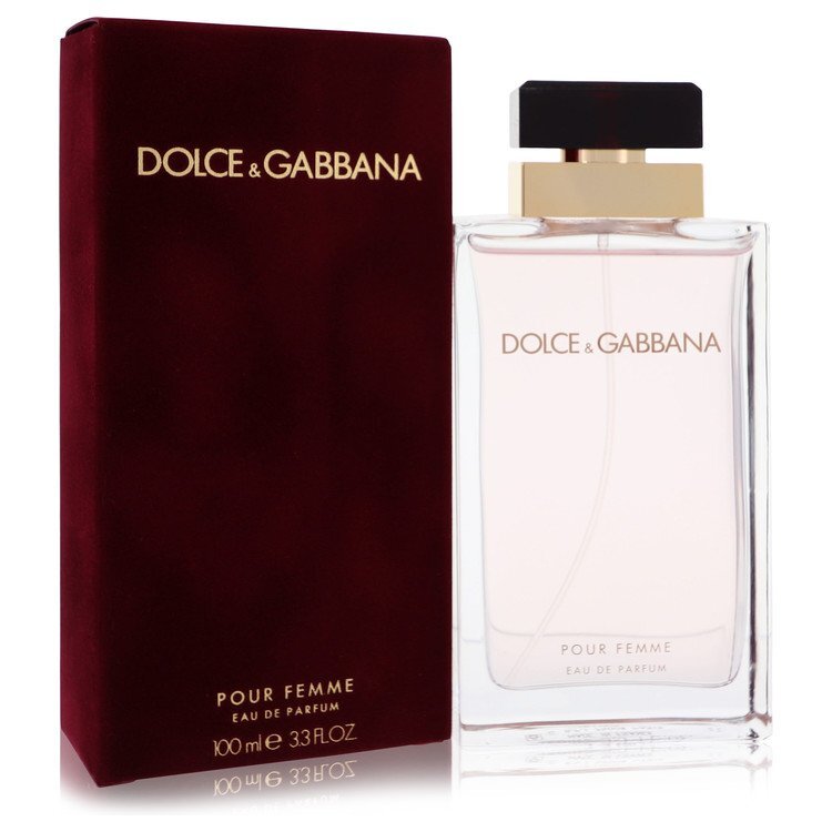 Dolce & Gabbana Pour Femme Eau De Parfum Spray 3.4 oz in elegant glass bottle with floral accents.