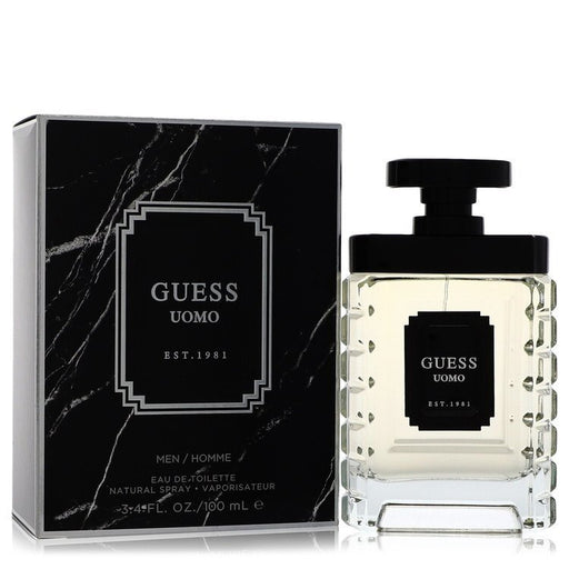 Guess Uomo by Guess Eau De Toilette spray for men, 3.4 oz bottle with sleek packaging and stylish design.
