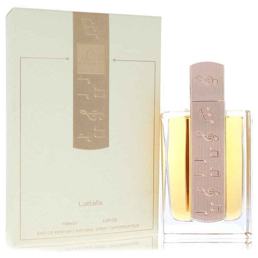 Lattafa Angham Eau de Parfum spray in 3.4 oz bottle, elegant design, suitable for women and unisex fragrance lovers.