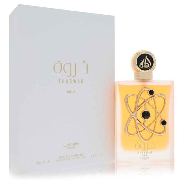 Lattafa Pride Tharwah Gold Eau De Parfum spray for women, 3.4 oz bottle with gold accents, elegant fragrance presentation.