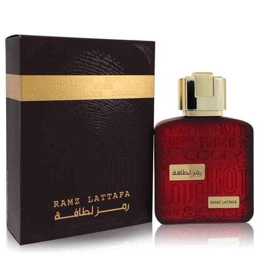 Lattafa Ramz Gold Eau De Parfum spray 3.4 oz for women and unisex, elegant gold bottle with a sleek design.