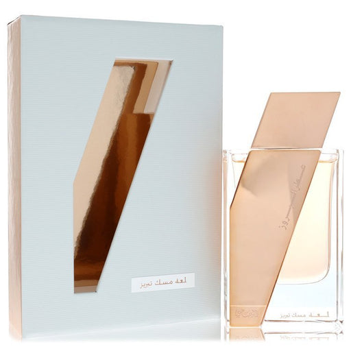 Rasasi Attar Al Boruzz Lamaat Musk Tabriz Eau De Parfum spray bottle with a sleek design, 1.7 oz, suitable for men and women.