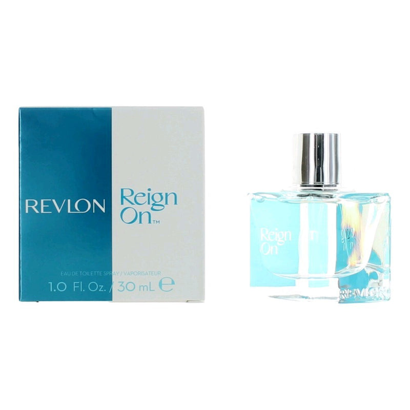 Reign On by Revlon 1 oz Eau De Toilette Spray for Women in a sleek bottle with floral accents.